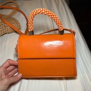 Small orange crossbody bag